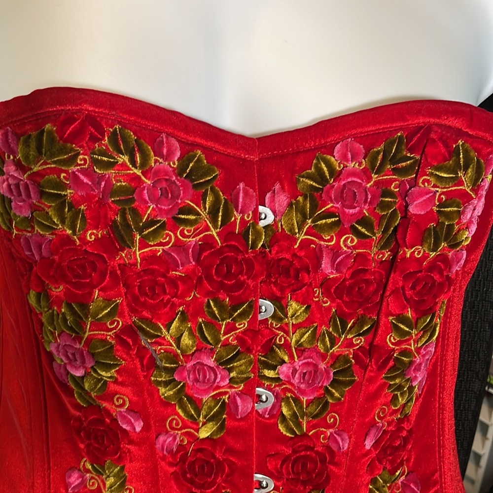 Corset hand appliqué roses on rich romantic red velvet.